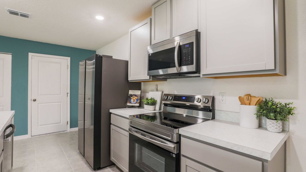 Representative furnished interior of a home built from the Iris by Maronda Homes in Labelle, Labelle (Image 5).