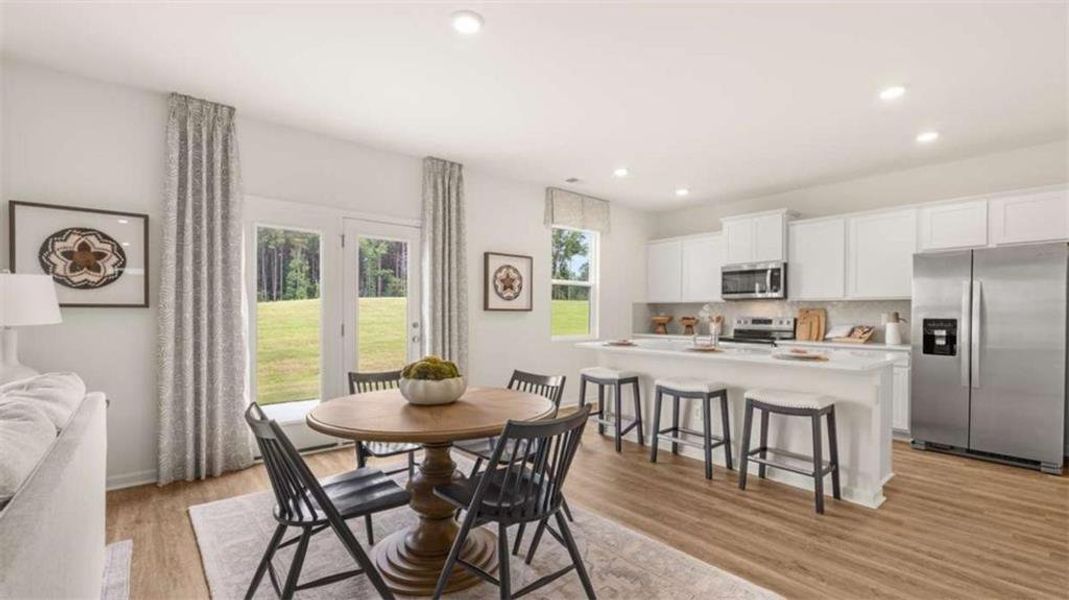 Furnished interior view inside a new home in Oakchase at Hampton, Hampton (Image 4).