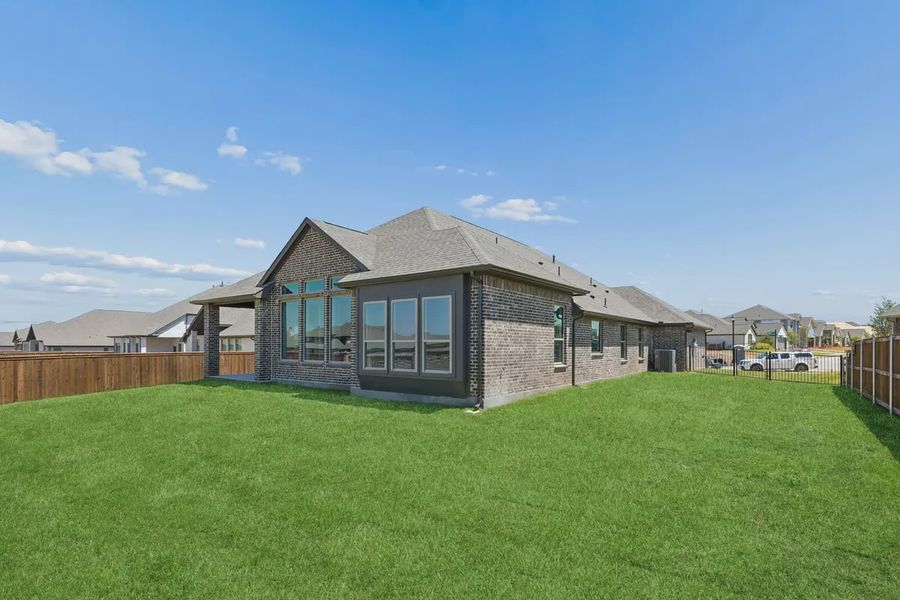 Exterior details and patio area of a home in Silo Mills, Joshua (Image 3).