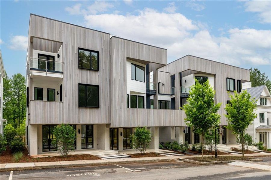 Front exterior of a new home in , Chattahoochee Hills, GA, highlighting curb appeal (Image 1).