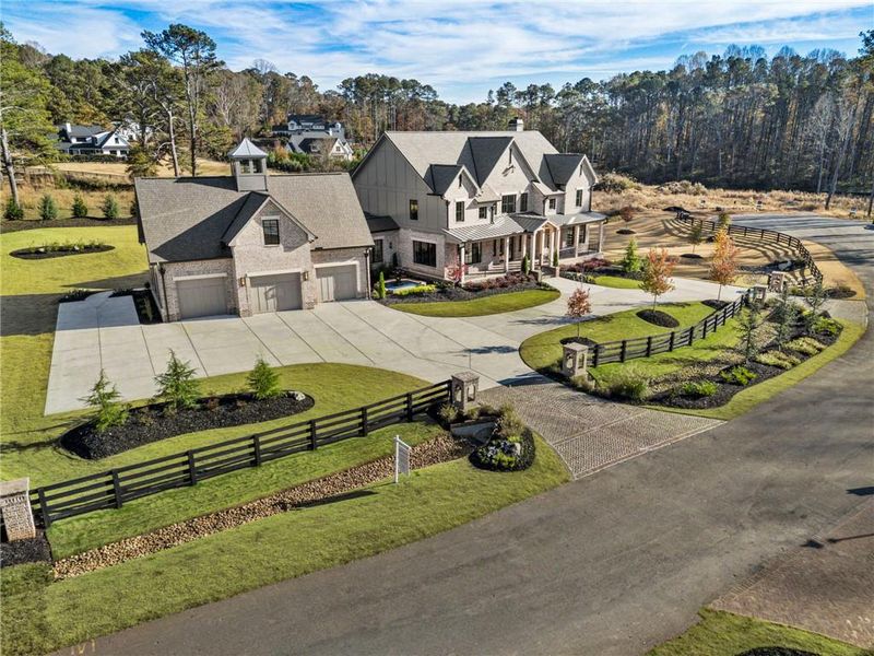 Front exterior of a new home in , Alpharetta, GA, highlighting curb appeal (Image 34).