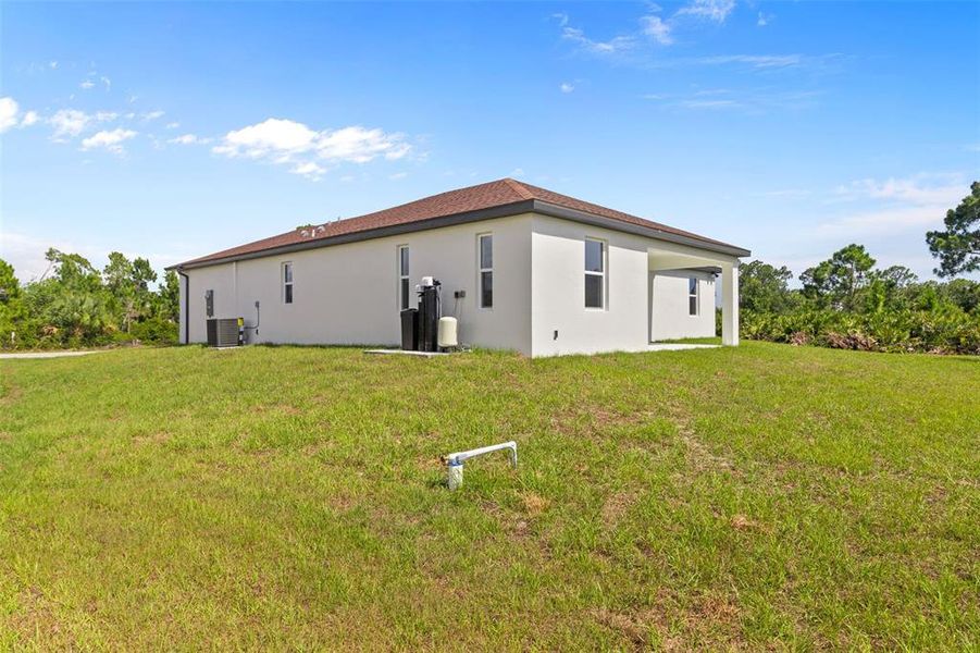 Exterior details and patio area of a home in , Port Charlotte (Image 24).