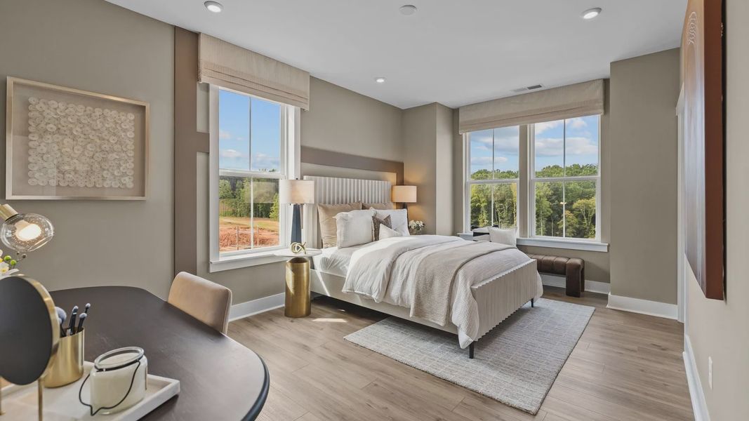 Furnished interior view inside a new home in The River District Townhomes, Charlotte (Image 14). Furnished interior view inside a new home in The River District Townhomes, Charlotte (Image 14).