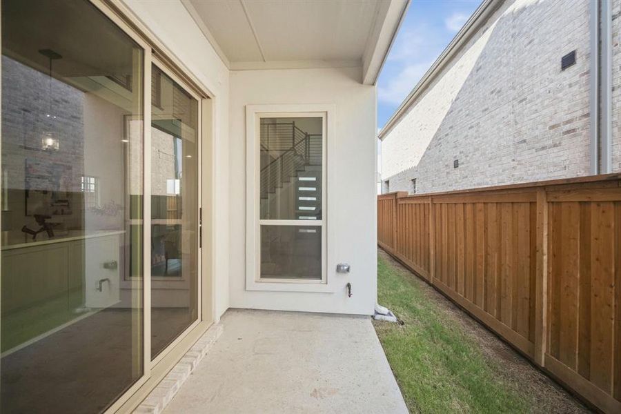 Exterior details and patio area of a home in Fields Villas - Darling Homes, Frisco (Image 4).