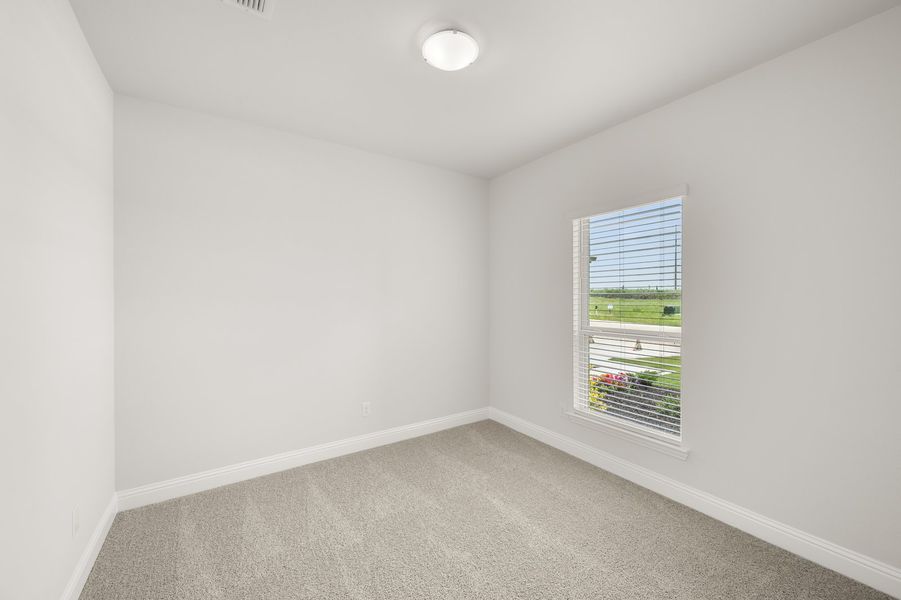 Front exterior of a new home in Still Water Lake Estates, Godley, TX, highlighting curb appeal (Image 25).