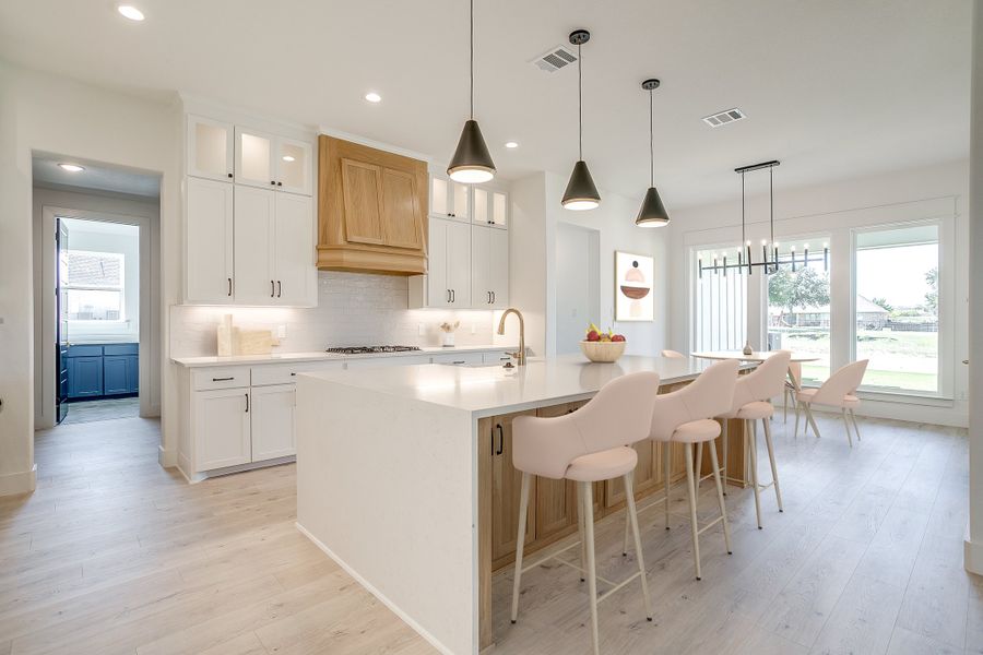 Representative furnished interior of a home built from the The Plano by Kenmark Homes in Coyote Crossing, Godley (Image 2). Representative furnished interior of a home built from the The Plano by Kenmark Homes in Coyote Crossing, Godley (Image 2).