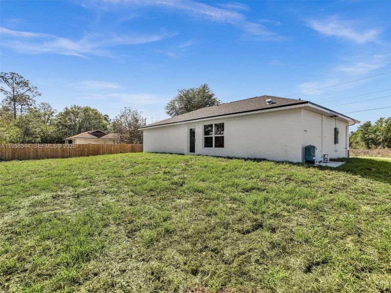 Exterior details and patio area of a home in , Lehigh Acres (Image 3).