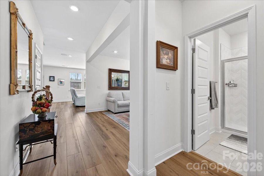 Front entry way leading to the dining/sitting room. The main level bedroom and bath are to the right, just off the foyer.