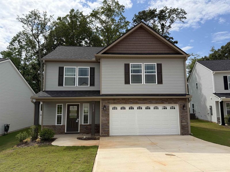 Front exterior of a new home in Cleveland Meadows, Spartanburg, SC, highlighting curb appeal (Image 1). Front exterior of a new home in Cleveland Meadows, Spartanburg, SC, highlighting curb appeal (Image 1).