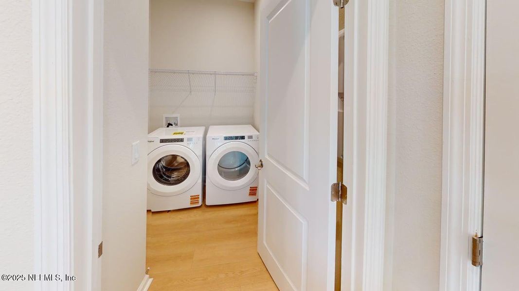 Furnished interior view inside a new home in RiverTown - WaterSong, St. Johns (Image 12).