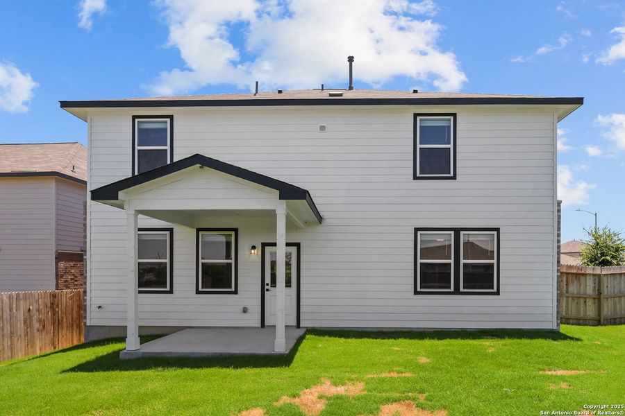Front exterior of a new home in Comanche Ridge, San Antonio, TX, highlighting curb appeal (Image 72). Front exterior of a new home in Comanche Ridge, San Antonio, TX, highlighting curb appeal (Image 72).