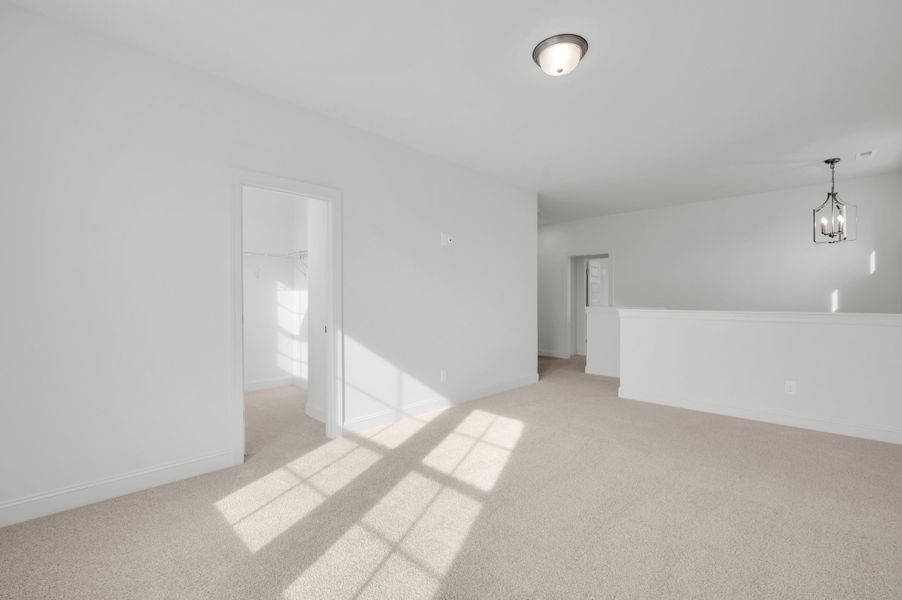 Representative unfurnished interior of a home built from the The Hampton by RobuckHomes in Windwater, Hampstead (Image 24).