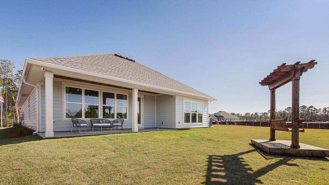 Representative exterior photo of a completed home built from the Jubilee by D.R. Horton in Breakfast Point East Phase II, Panama City Beach, FL (Image 22).