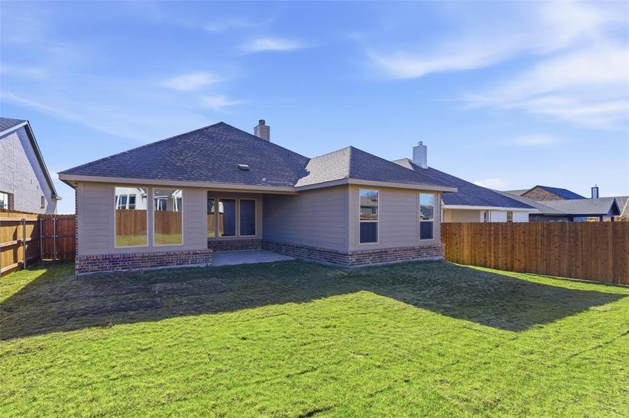Exterior details and patio area of a home in Liberty Pointe, Gainesville (Image 18).