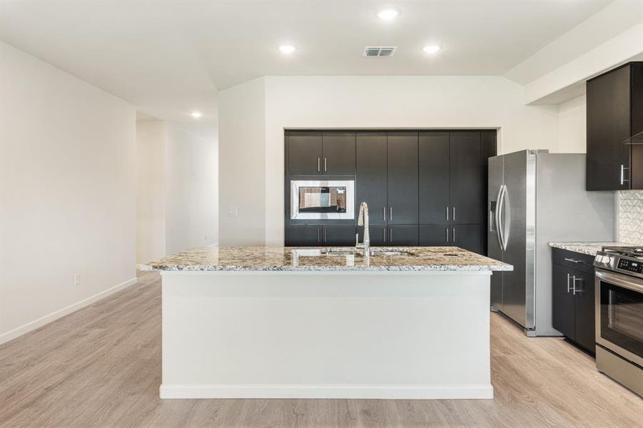Furnished interior view inside a new home in Eagle Glen Elements, Alvarado (Image 18).