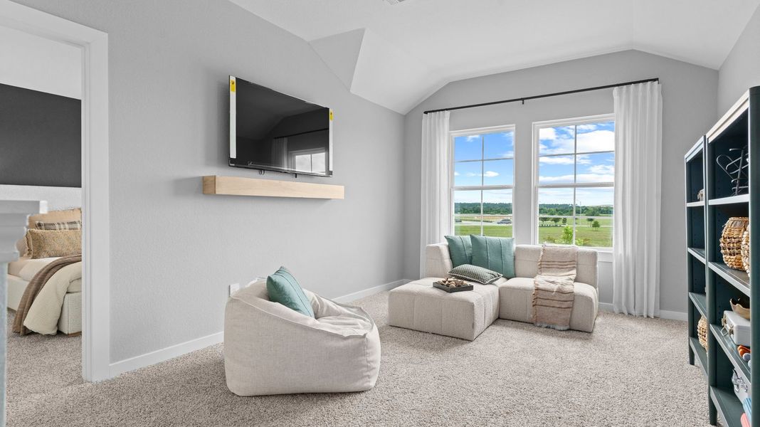 Furnished interior view inside a new home in Caldwell Crossing, Iowa Colony (Image 10).
