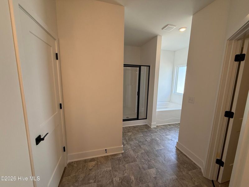 Spacious, unfurnished interior of a new home in Wood Creek Landing, Leland (Image 37).