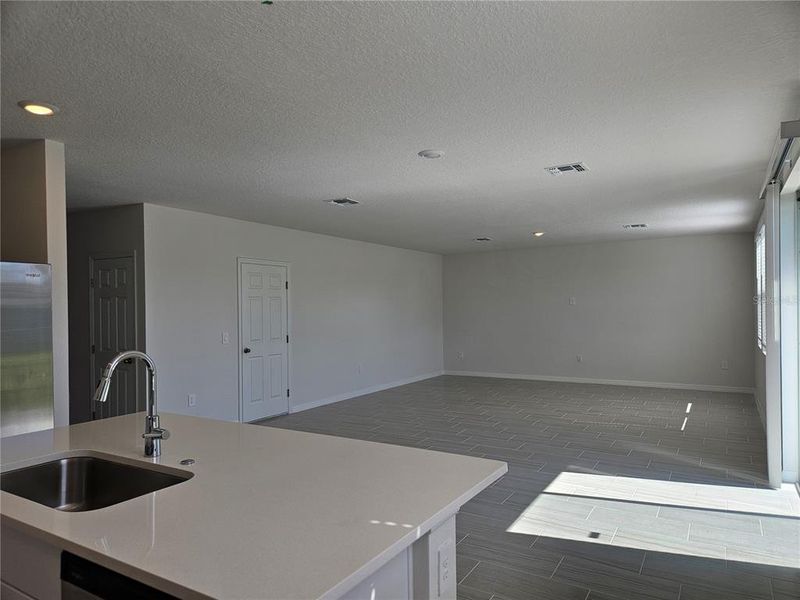 Furnished interior view inside a new home in Lawson Dunes - Signature Series, Haines City (Image 12).