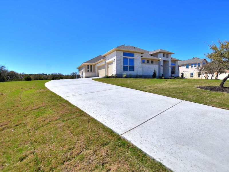 Representative exterior photo of a completed home built from the San Simeon I by Giddens Homes in Clearwater Ranch, Liberty Hill, TX (Image 42).