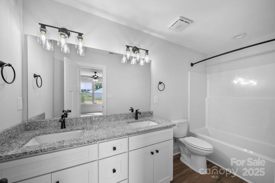 Furnished interior view inside a new home in , Wingate (Image 8).