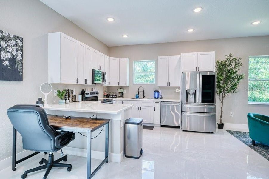 Furnished interior view inside a new home in , Port Charlotte (Image 14). Furnished interior view inside a new home in , Port Charlotte (Image 14).