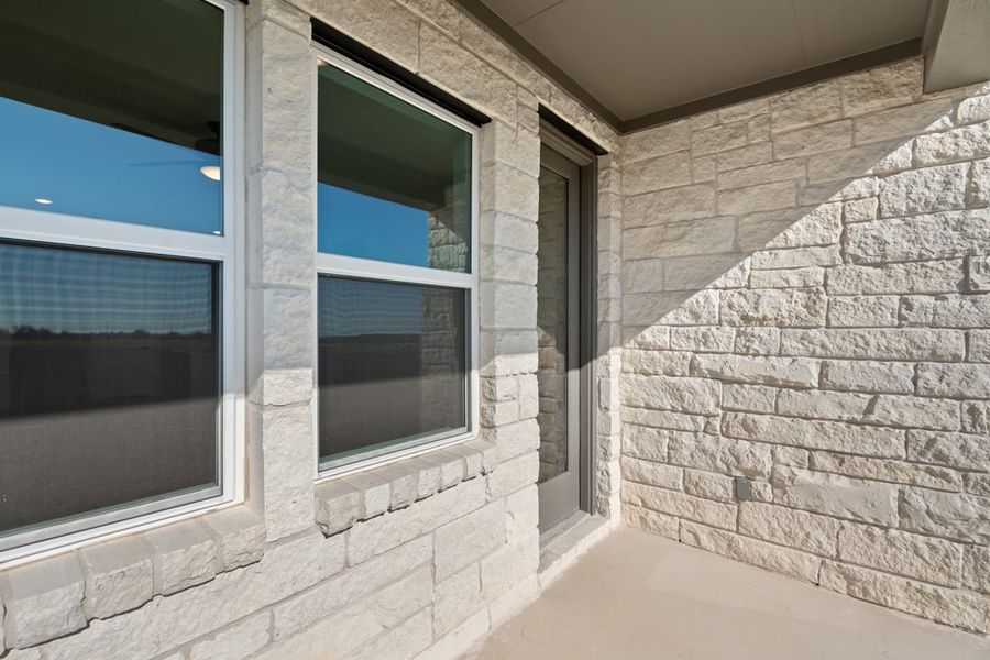 Exterior details and patio area of a home in Union Collection at Park Central, Georgetown (Image 25).