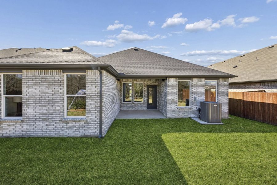 Exterior details and patio area of a home in Mercer Meadows, Royse City (Image 3).