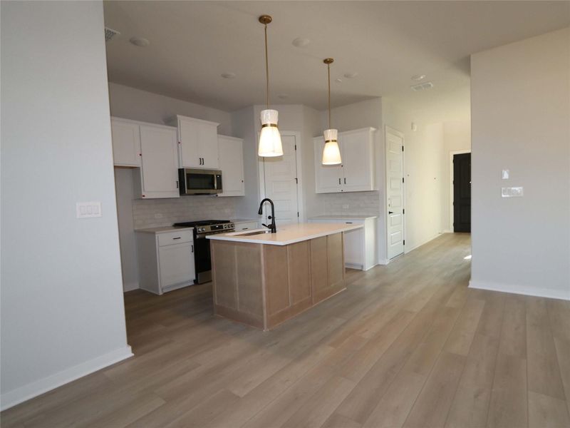 Furnished interior view inside a new home in Estancia West, Manchaca (Image 8).