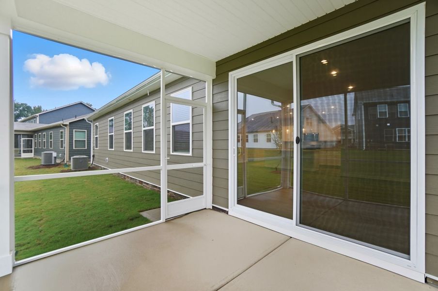 Exterior details and patio area of a home in Waxhaw Landing, Monroe (Image 3).
