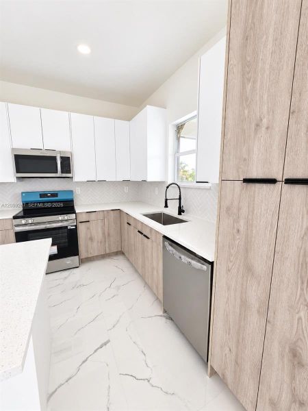 Furnished interior view inside a new home in , Lehigh Acres (Image 7).