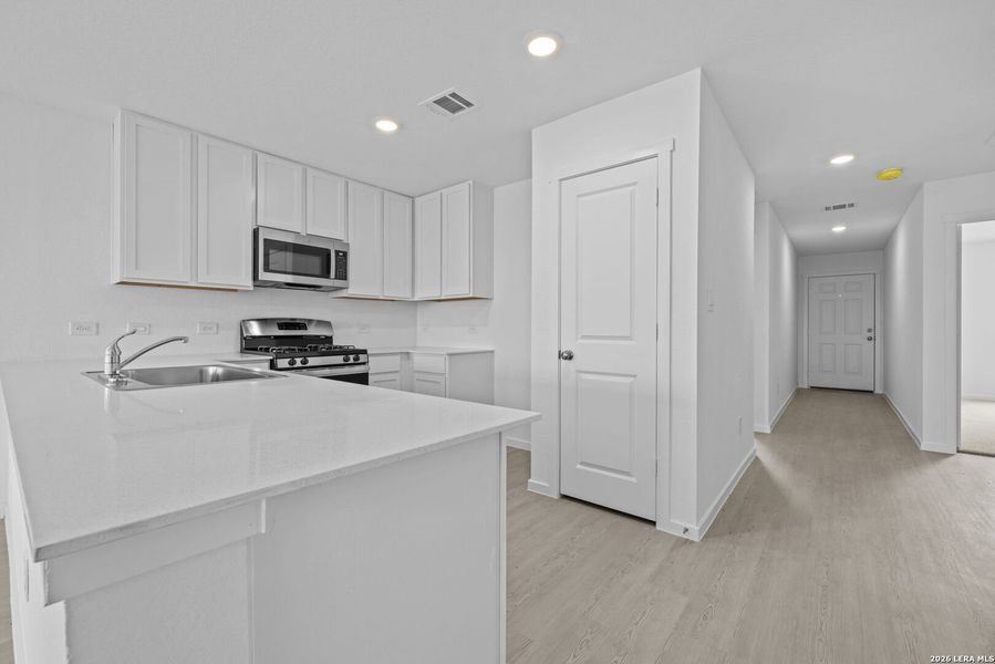 Furnished interior view inside a new home in Spring Grove, St. Hedwig (Image 4).