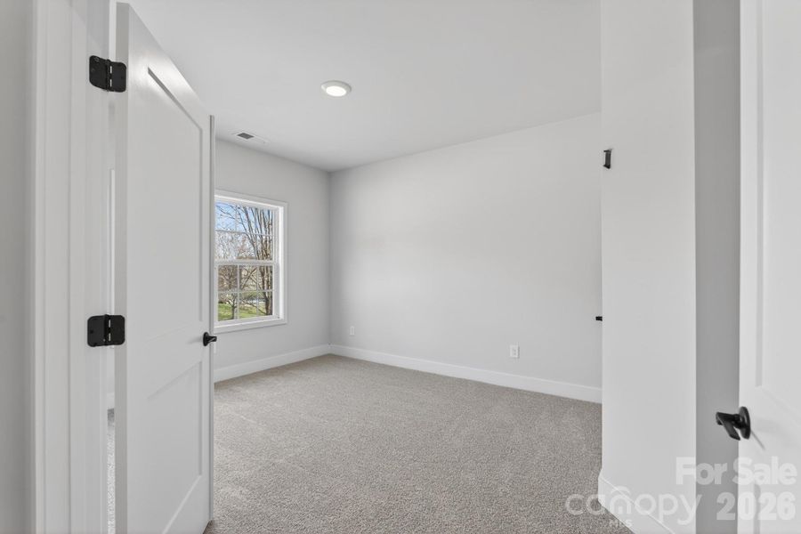 Spacious, unfurnished interior of a new home in Crystal Village, Albemarle (Image 10).