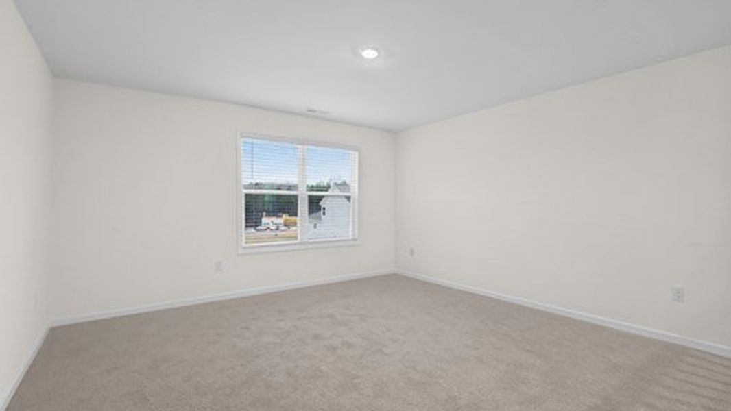Representative unfurnished interior of a home built from the Tillery by D.R. Horton in The Estates Park, Apex (Image 25).