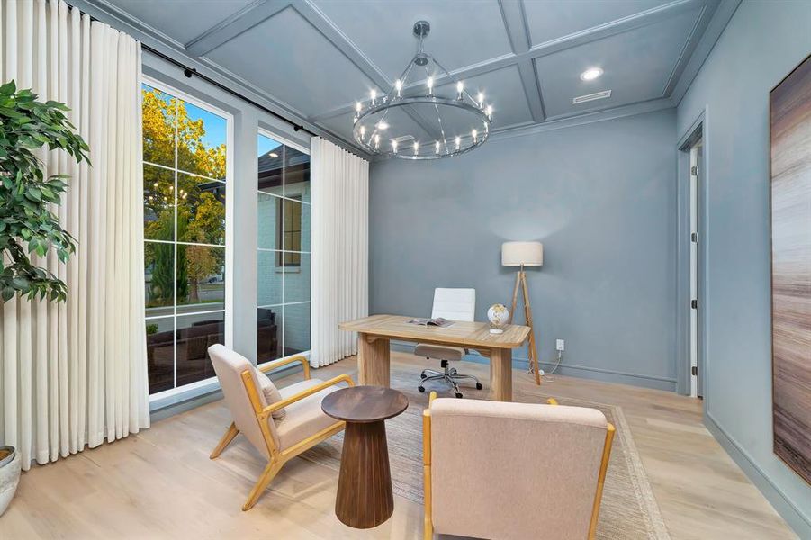 Home office with wood finished floors, a chandelier, and coffered ceiling Home office with wood finished floors, a chandelier, and coffered ceiling