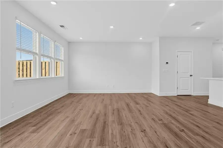 Spacious, unfurnished interior of a new home in Towns at Holly Springs, Holly Springs (Image 17). Spacious, unfurnished interior of a new home in Towns at Holly Springs, Holly Springs (Image 17).