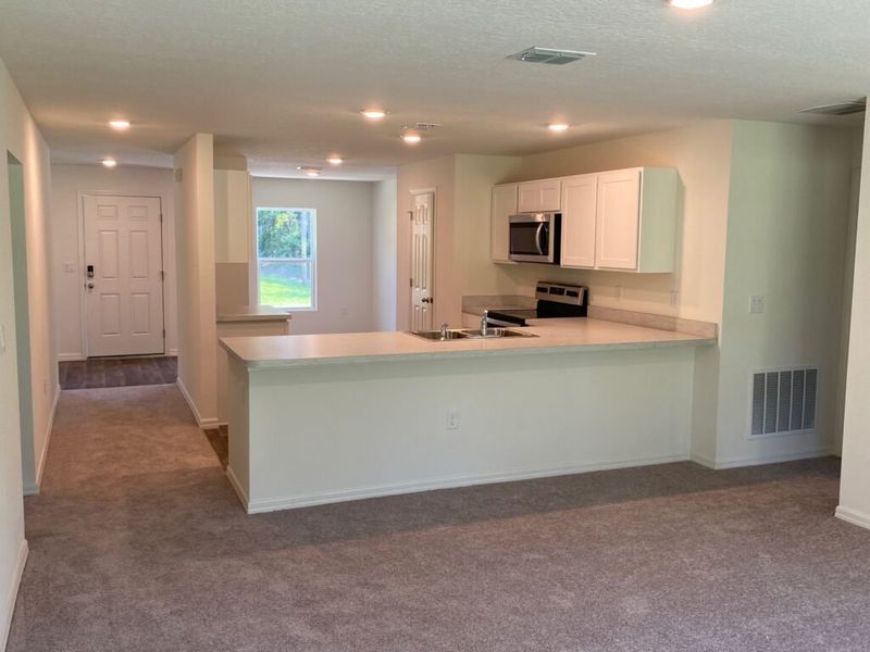Representative furnished interior of a home built from the Foxtail by Holiday Builders in Ocala, Ocala (Image 5).