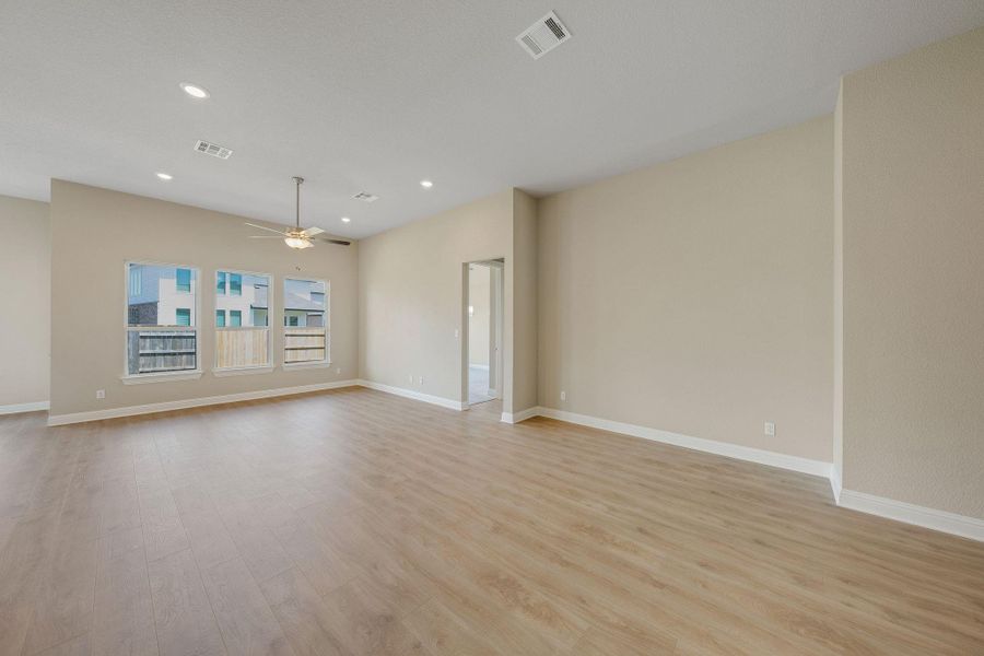 Unfurnished room featuring light wood-type flooring, recessed lighting, and ceiling fan
