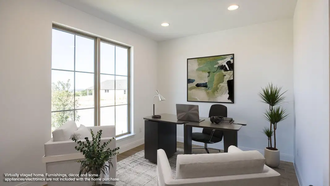 Office area with wood finished floors and recessed lighting Office area with wood finished floors and recessed lighting