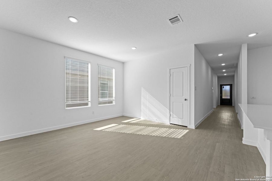 Spacious, unfurnished interior of a new home in Waterwheel: Coastline Collection, San Antonio (Image 16).