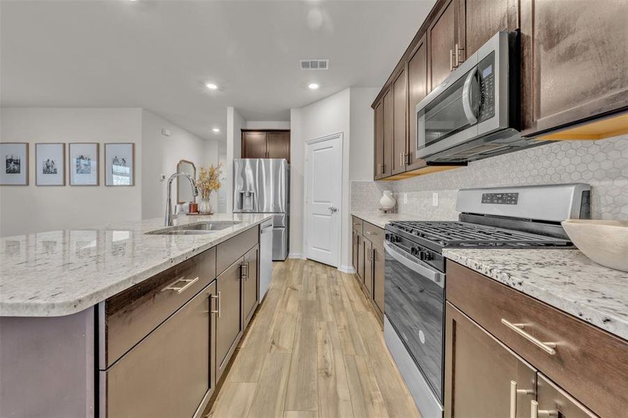 Furnished interior view inside a new home in Briarwood Hills - Highland Series, Forney (Image 14). Furnished interior view inside a new home in Briarwood Hills - Highland Series, Forney (Image 14).