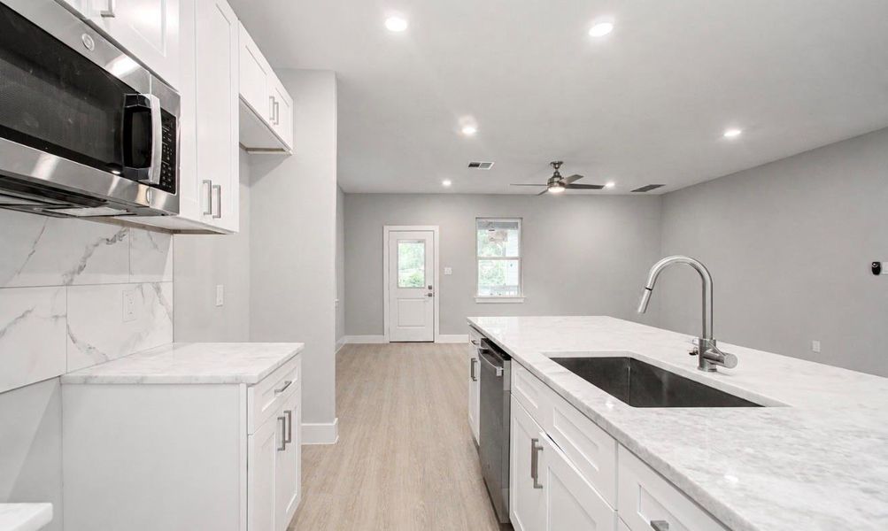 Furnished interior view inside a new home in , Houston (Image 9).