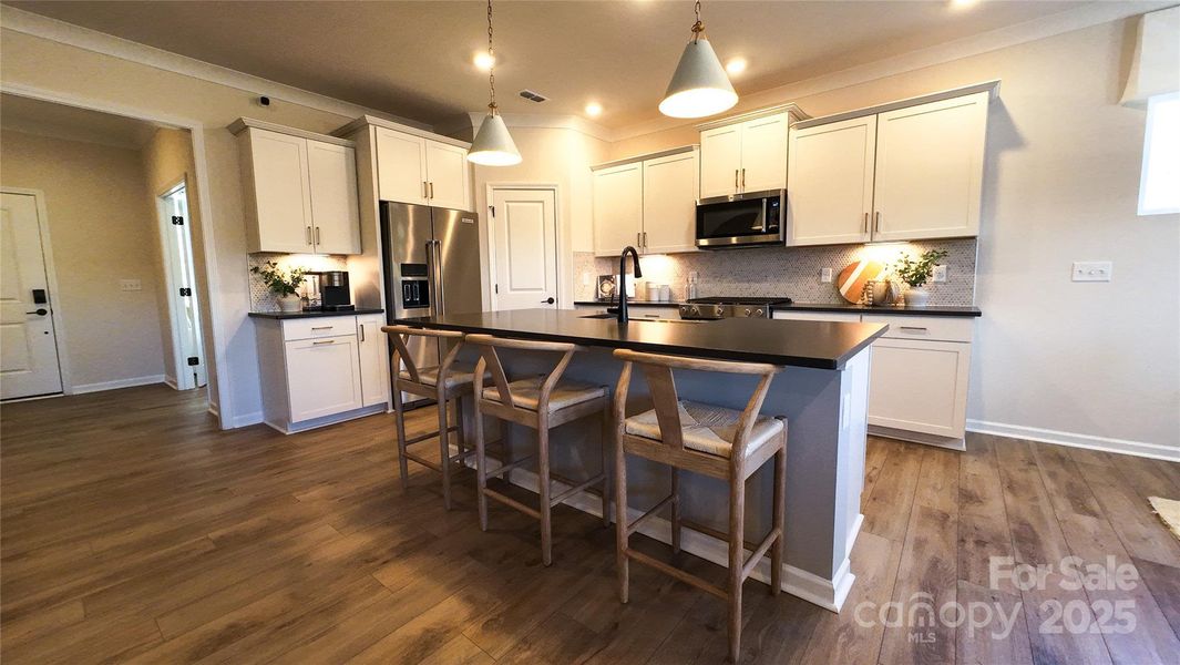 Furnished interior view inside a new home in Bryton, Huntersville (Image 14).