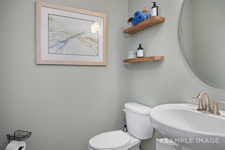 Bathroom featuring toilet and sink