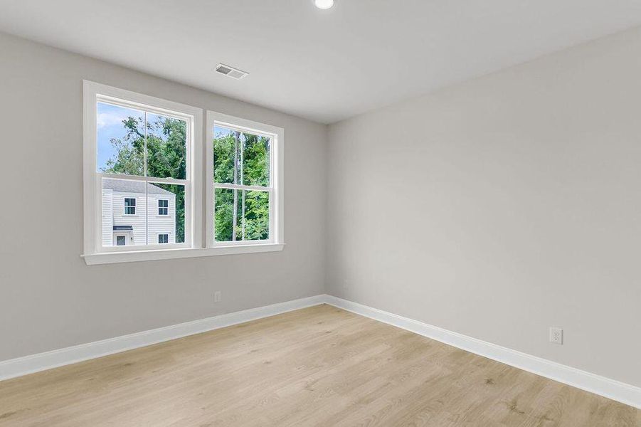 Spacious, unfurnished interior of a new home in Heron Preserve, Hanahan (Image 24). Spacious, unfurnished interior of a new home in Heron Preserve, Hanahan (Image 24).