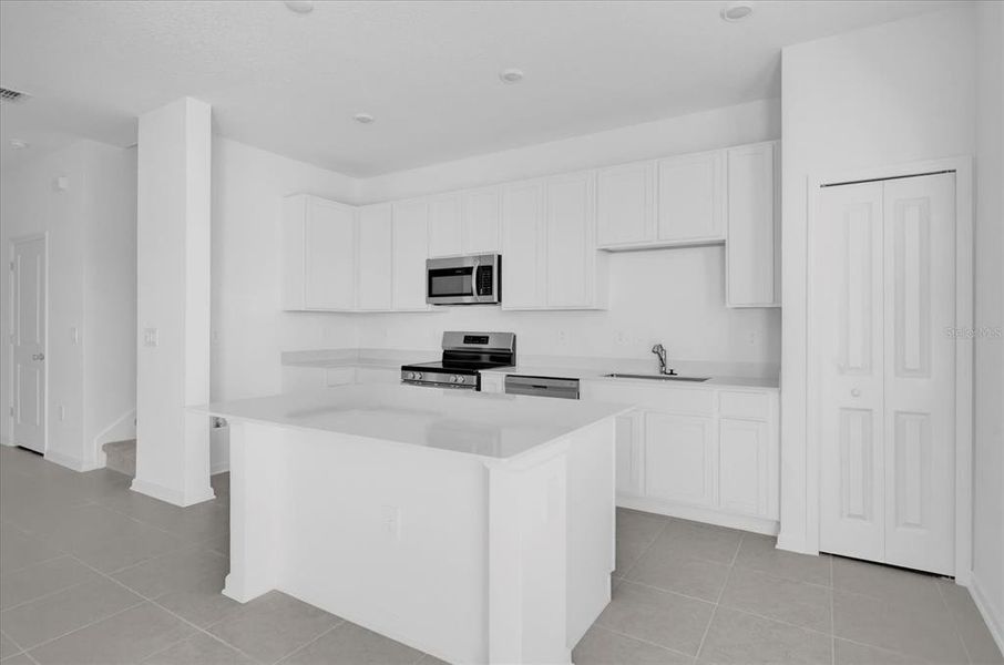 Furnished interior view inside a new home in , Kissimmee (Image 5).