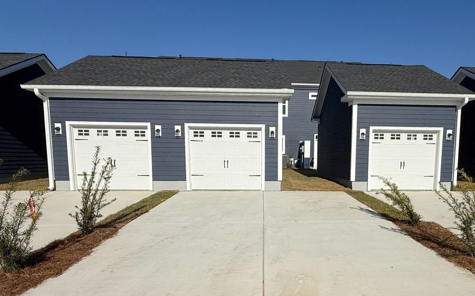 Front exterior of a new home in Townhomes at Nexton, Summerville, SC, highlighting curb appeal (Image 26).
