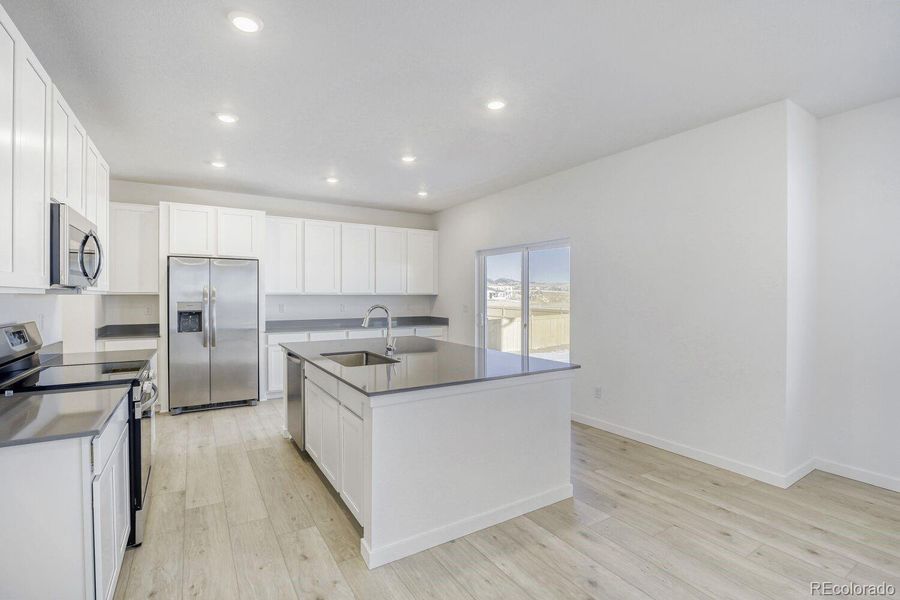 Furnished interior view inside a new home in Riano Ridge, Loveland (Image 5).
