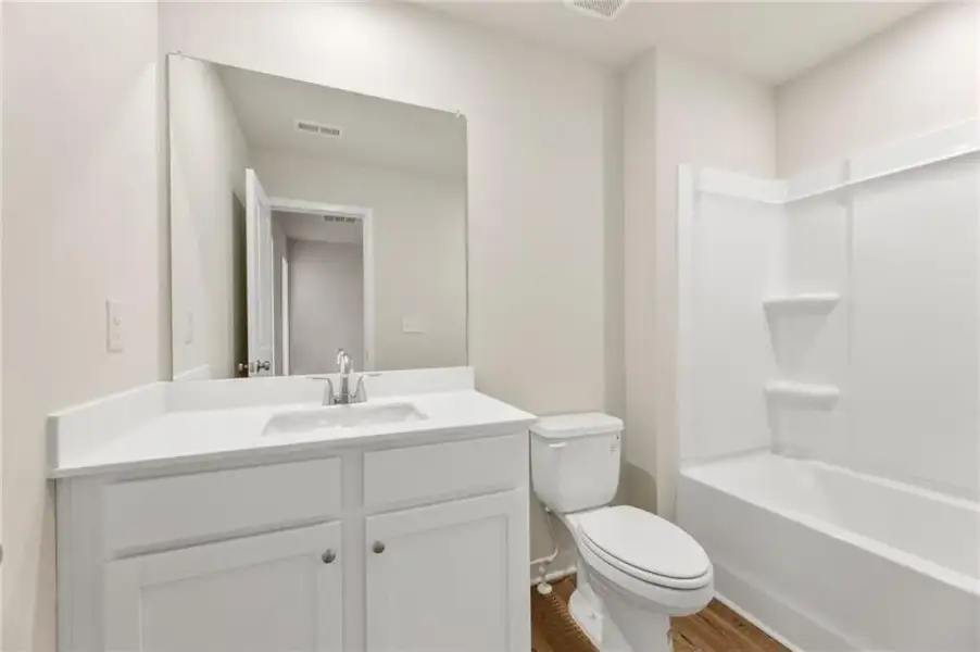 Furnished interior view inside a new home in Sherwood Square, Flowery Branch (Image 10). Furnished interior view inside a new home in Sherwood Square, Flowery Branch (Image 10).