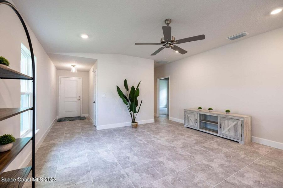 Representative unfurnished interior of a home built from the 1415 by Adams Homes in Winding Oaks, Weeki Wachee (Image 12).