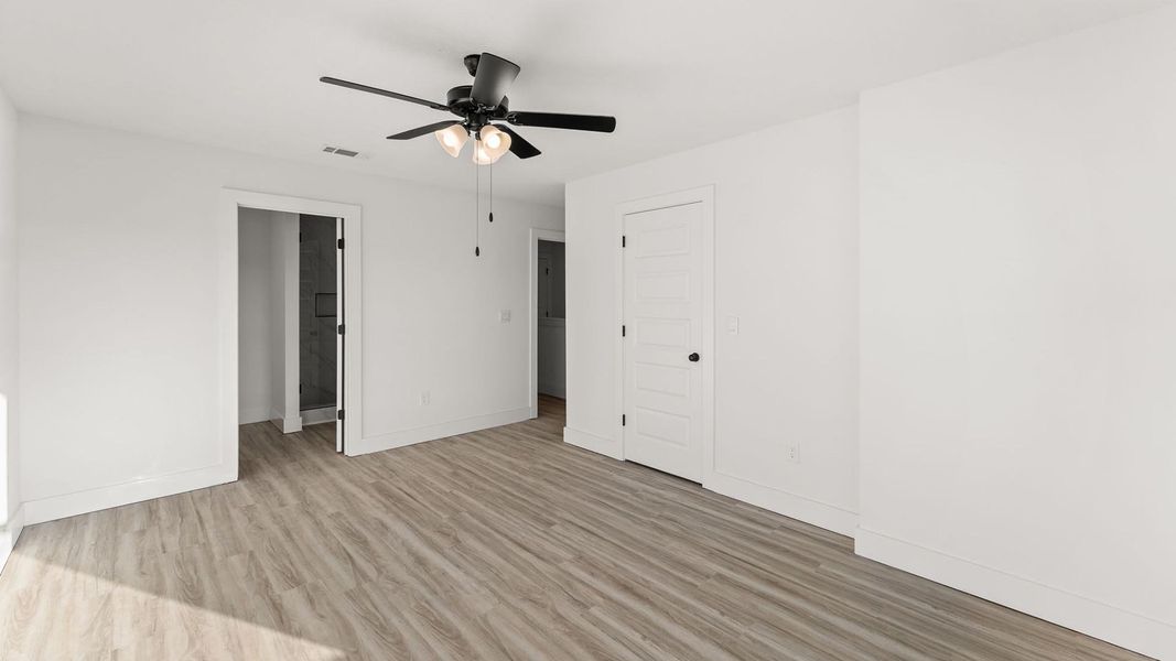 Spacious, unfurnished interior of a new home in Colonial East Townhomes, Panama City Beach (Image 22).